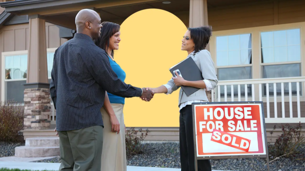 Hanover real estate agent Christine Dell Associate Broker Re/Max Quality Service Inc congratulates homebuyers after sale